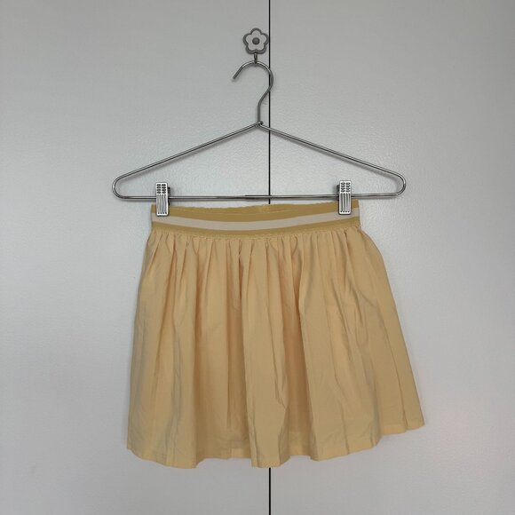Girlfriend Collective Lemonade Pleated Club Skort - Picture 1 of 4